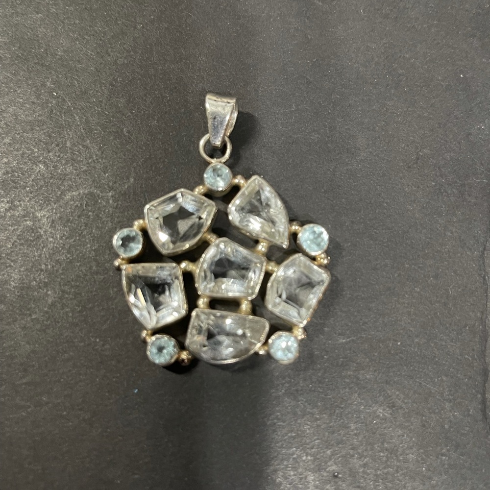 Light blue crystal sterling silver pendant.
